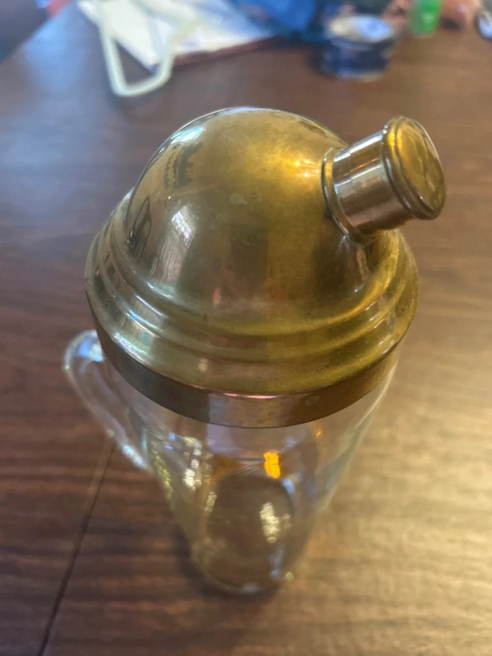 Atomic Glass Shaker bottle with brass lid.